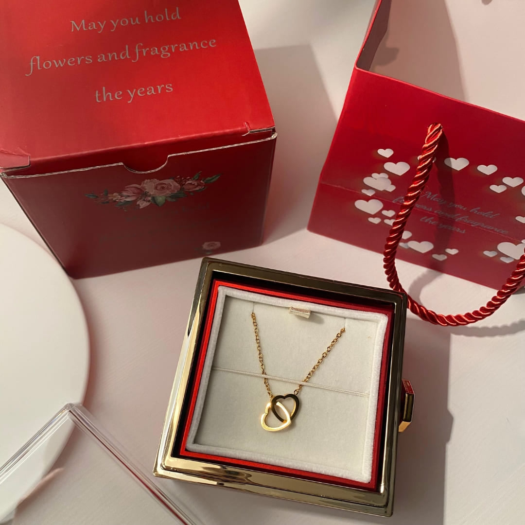 Close-up of the red elegant rose jewelry gift box in high-quality packaging, perfect for special occasions.