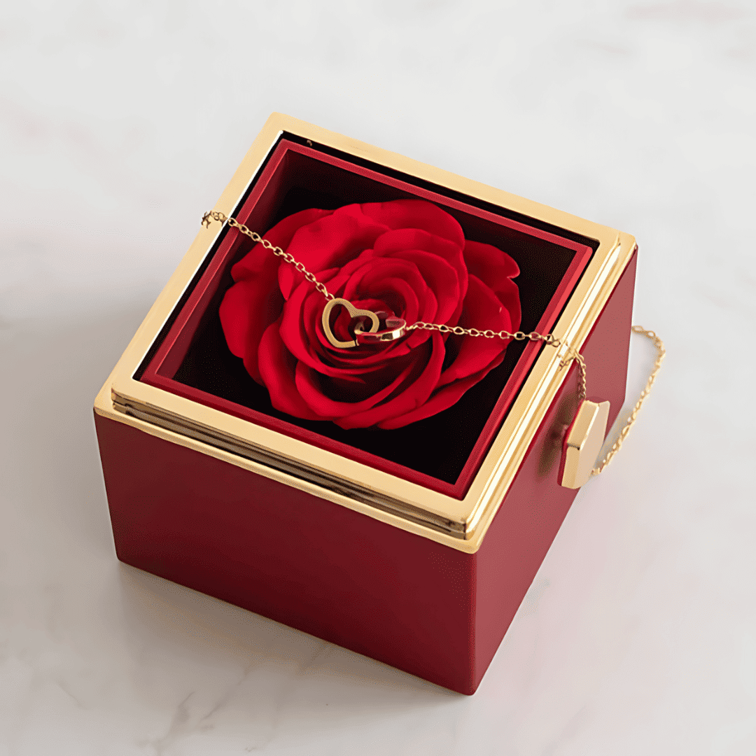 Top view of the elegant red rose jewelry gift box with a luxurious rose centerpiece, ideal for romantic gifts