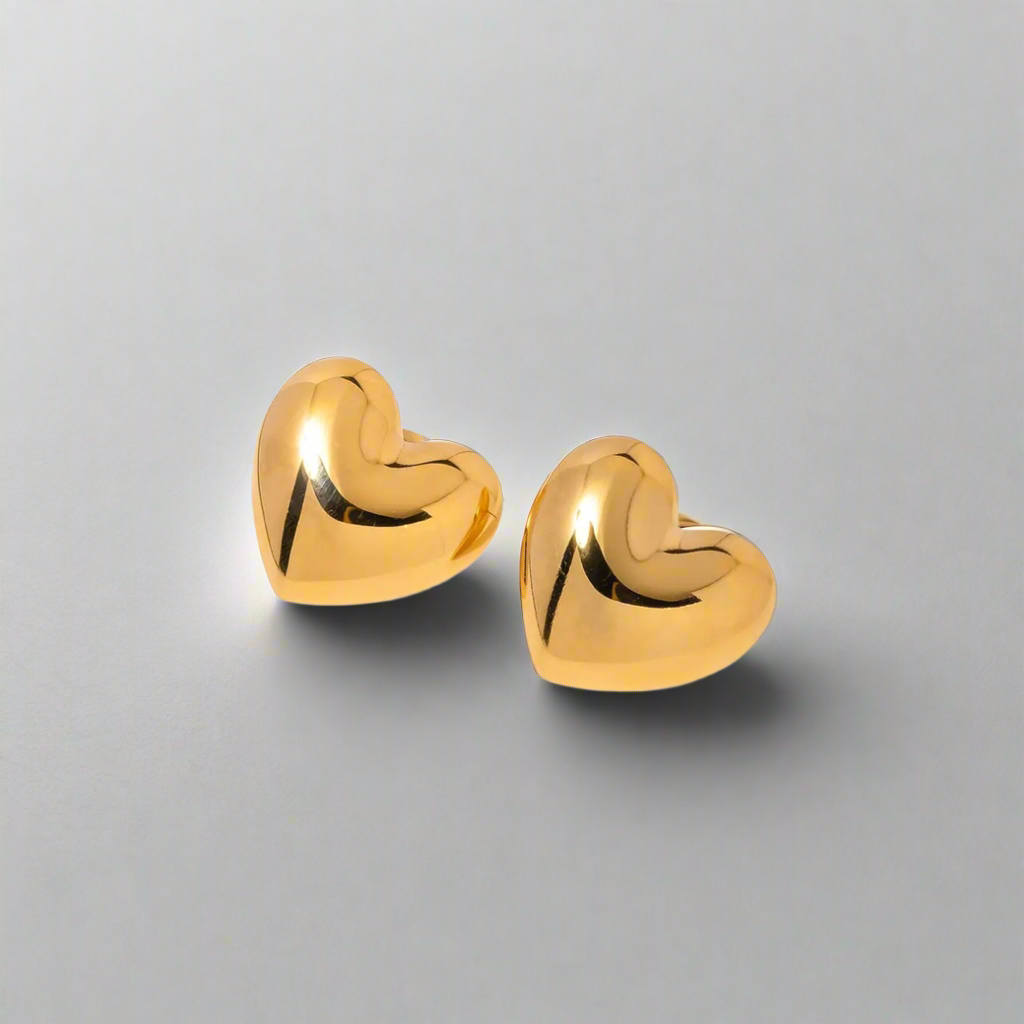 Elegant gold heartbeat stud earrings for women, featuring a romantic heart silhouette.