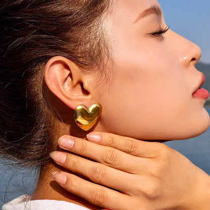 Beautiful heartbeat stud earrings in gold, ideal as a wedding, birthday, or anniversary gift.