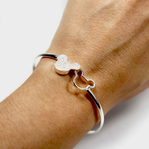 Lustre Harmony Bracelet in rose gold finish featuring a heart design, elegantly worn on a wrist.