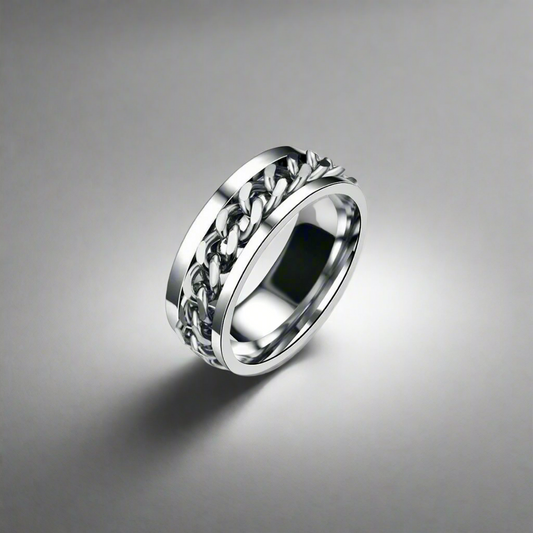 Stainless steel infinity statement ring with polished finish – a timeless unisex accessory.